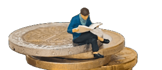 A figurine sitting on some coins, reading. Image for illustration