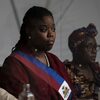 Jada Brihanna (Brenda Turner) rappresentante del querelante per Haiti e Assane Tendai (Rehema Luziga) rappresentante del querelante per il Mozambico