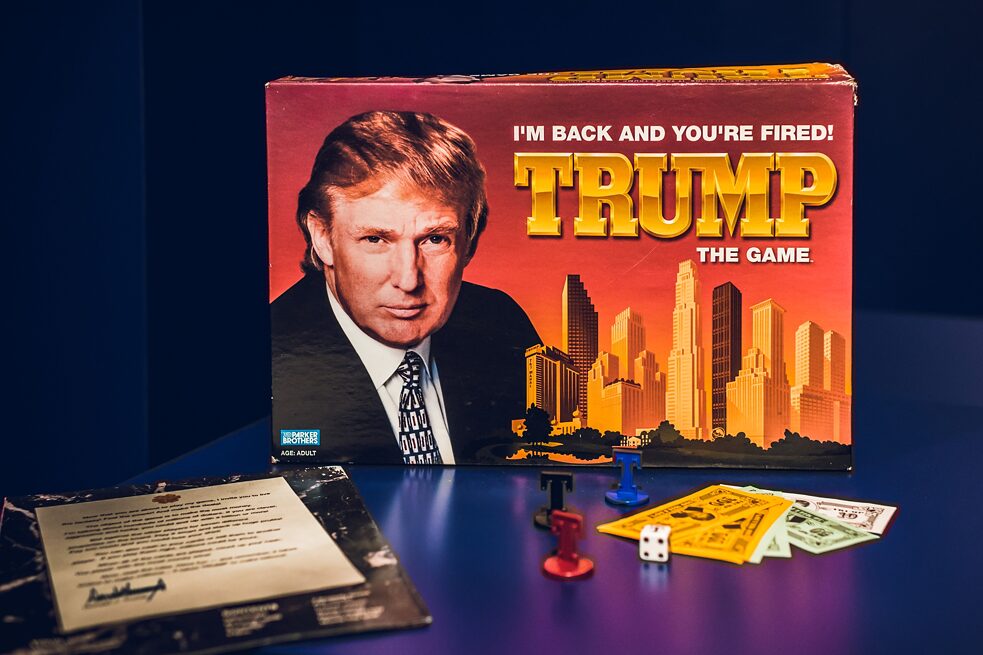 Trump: The Game / 1989–1990; 2004 – Inspired by Donald Trump’s real estate business, this game is about buying and selling real estate. It was described as a boring and complicated variation of the popular game Monopoly, though Trump himself said it was “much more sophisticated than Monopoly.” Most people who bought the game probably did not bother reading the ten pages of instructions. The game was relaunched in 2004, following Trump’s success with the television series “The Apprentice.” It flopped, despite simplified game rules, and even more pictures of Trump. According to one review of the game, “It is not a game you want to play again.”