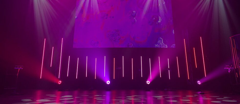 Empty stage with purple lights