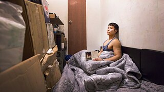 3 Quadratmeter - Ein junger Mann in seinem Zimmer in Peking 
