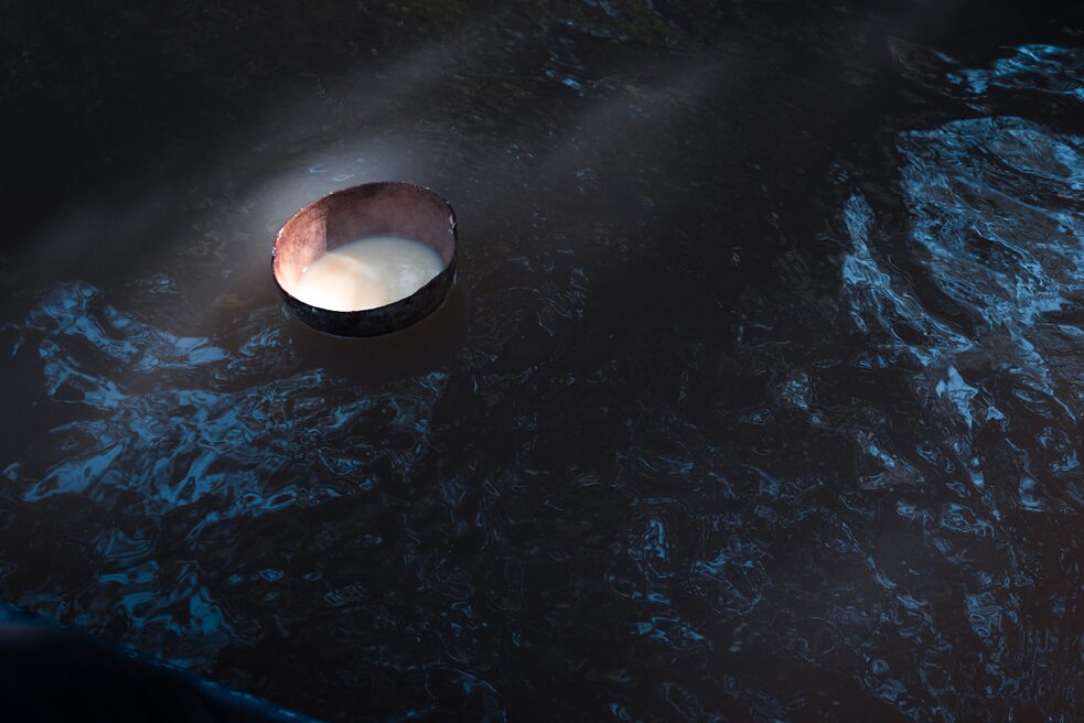 A pilche with chicha floats on the sacred Rotuno River.