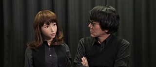 AI-driven robot ERICA talks with her inventor Hiroshi Ishiguro