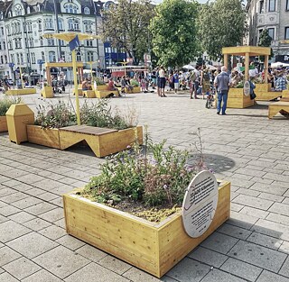 Kaum Autos, dafür viel soziales Leben auf grünen Plätzen: Könnte die Zukunft der Stadt so aussehen, wie beim Tag des guten Lebens in Köln?
