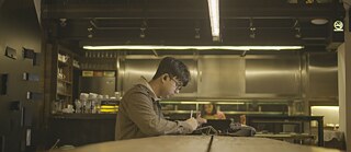 Cafe Mango Sayeef sketches away as Sameera works on her dish in the background