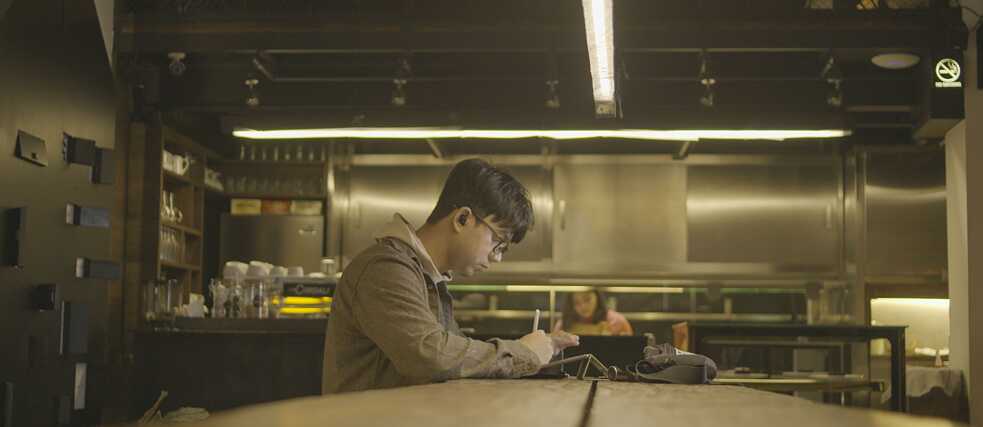 Cafe Mango Sayeef sketches away as Sameera works on her dish in the background