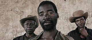 Guy Tillim, Justino Ngene, Laurino Bongue and Faucino, 2002. From the series Kunhinga