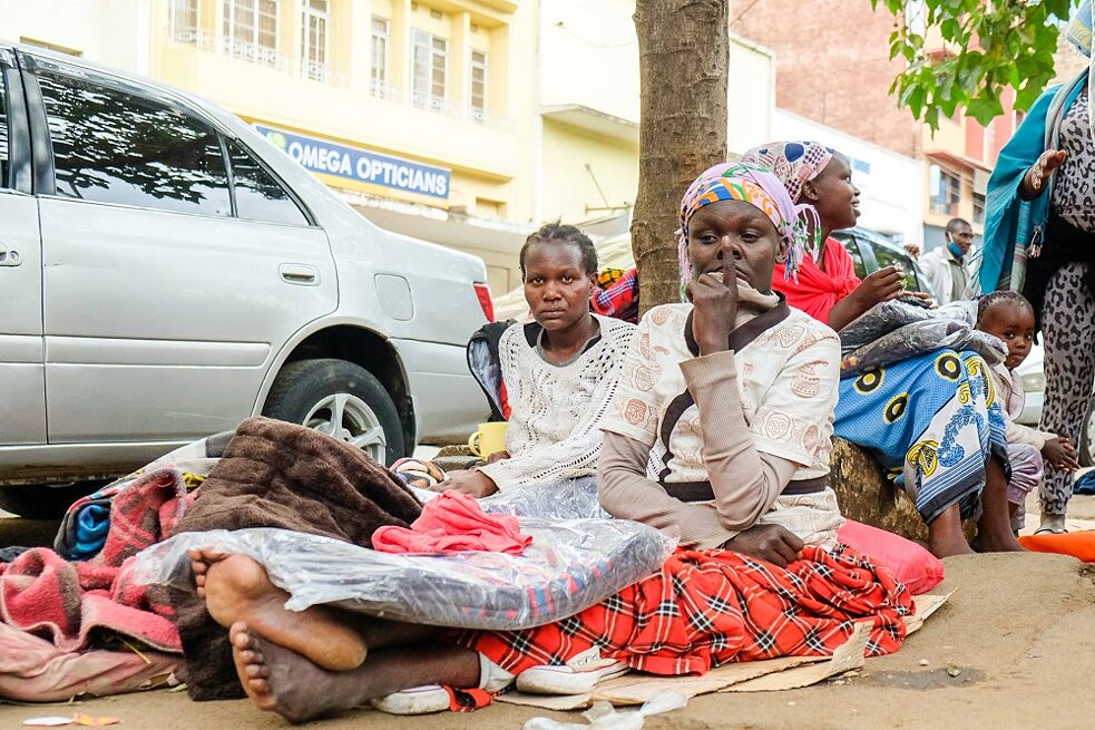 Mary and a member of her family living on the street