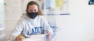 Student at a PASCH School taking an exam