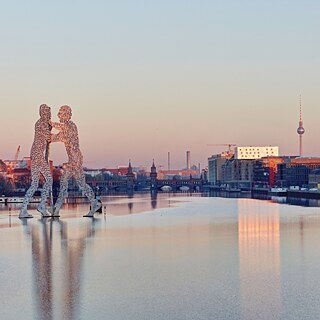 Molecule Man sculpture on the Spree River in Berlin