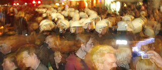 Riot police make their way through the crowds on 1 May 2008, on Oranienstrasse in Kreuzberg. 