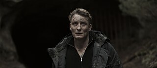 Ulrich Nielsen (played by Oliver Masucci) looks despondend and hopeless.