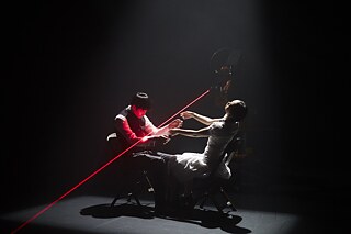 Taiwanese choreographer and inventor Huang Yi dances with industrial robot KUKA and dancers Hu Chien and Lin Jou-Wen.