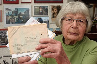 Helma Schmidt with the letters the present pope wrote her and her husband.