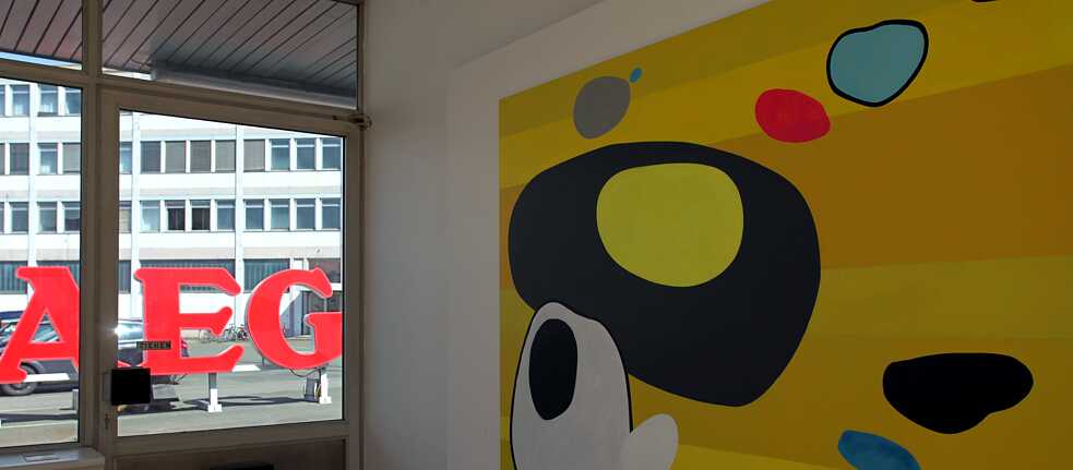 Art is on display “at AEG”.