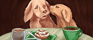 Kaks koera laua taga fika ajal