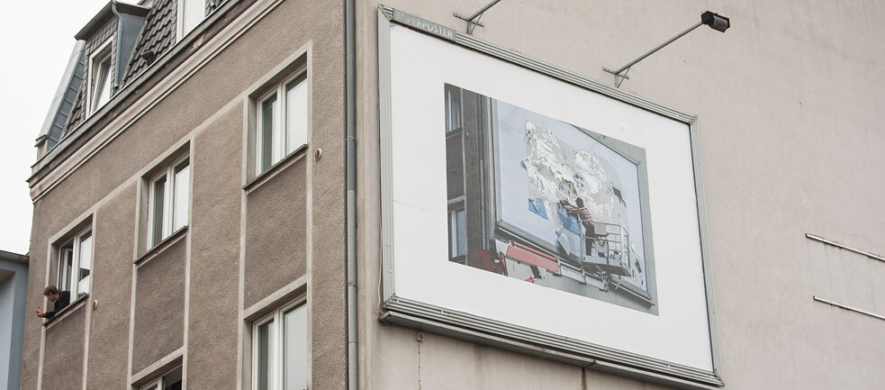 During the CityLeaks Festival 2019, artist Andrey Ustinov booked a billboard in Cologne-Ehrenfeld and covered it with a photo of himself. “Iconoclach” remained on the billboard for 20 days.