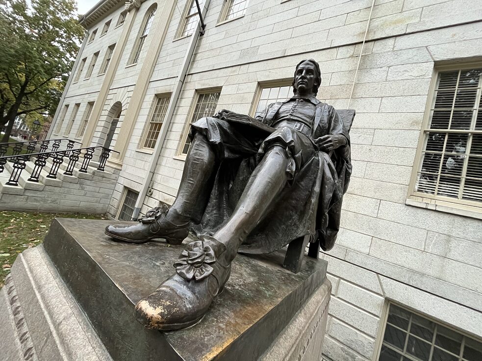 A statue of Harvard’s founder. 