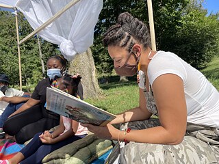 Fugitive Sanctuary, Community Pop up in Oxon Run Park, September 2021; Pictured: Jessica Valoris along with co-organizer, Alexis Mckenney; and participants: Camille Douglass, Deondre Rice. 