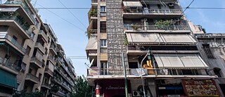Walking along Patission Street, Athens. 