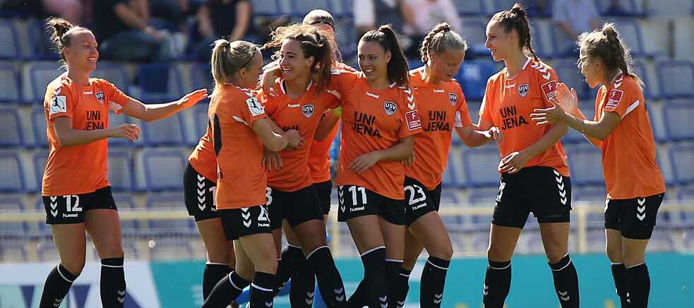 The FF USV Jena women celebrate a goal against rival 1. FFC Frankfurt in 2019. 