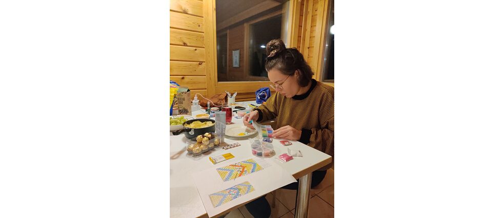 Marie-Andrée Gill crafting traditional patterns.