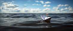 A paper boot in the water.