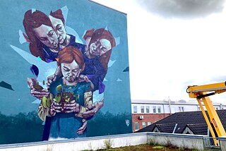 “CARE” is a visual statement on the symbiosis of the environment and society, which emerged from the aerosol of Daniel Westermeier aka Mister Woodland. It was created for the festival “Goch history meets StreetArt”, organised by the local history society Goch e.V. Artist:  Mister Woodland | Title: CARE | Location: Neustraße 20, Goch