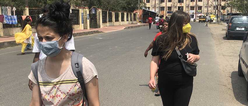 Aashti Miller and Greta von Richthofen survey the lanes of Kannagi Nagar.