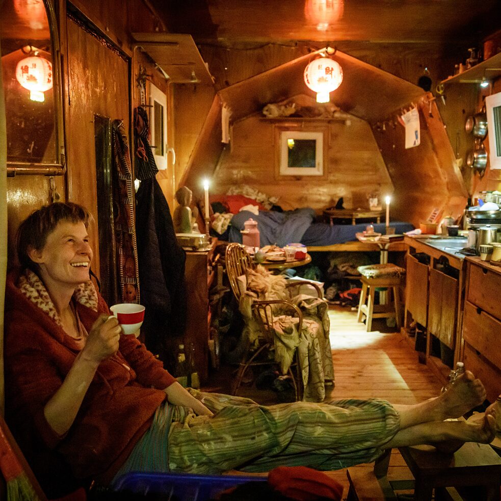 Franzi, a resident of Wagenburg Lohmühle in Berlin, in her trailer