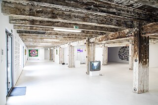 TECHNO WORLDS, exhibition view at aqb 2021 with Jeremy Shaw's Video "Morning Has Broken"(2001) in the foreground