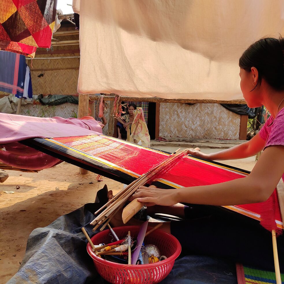 Indigenous craftswoman creating handloom textiles 