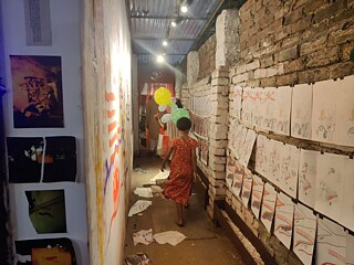   Khyapa Collective (left), AAA battery (left wall), Project Pudina on the right wall