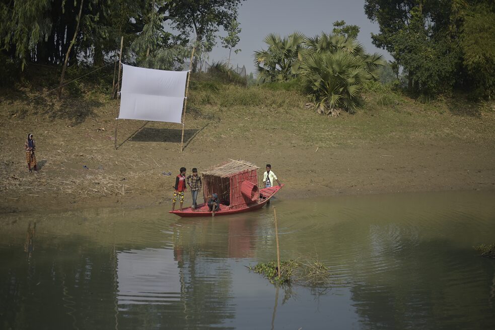   The workshop team built a photo boat for their participants to travel and experiment with different photo objects along the river. The screen in the background will be part of the following exhibition. 