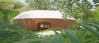 Modern African mud house with a round roof, surrounded by vegetation. 