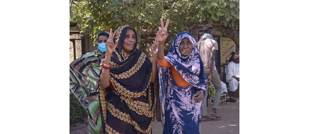 Women supporting the 19th December 2021 protest against the military coup in Khartoum's streets. 