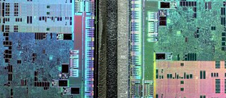 Abstract microscopic photography of a Graphics Processing Unit resembling a satellite image of a big city
