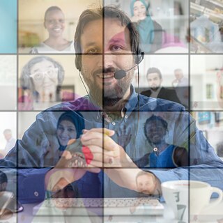 smiling human with online conferences