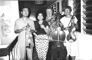 1984 Director Hans Sallmann (second from the right) and Winnie Cheah-Lim (second from the left) founded the Suria String Quartet.