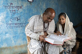 Ramcharitmanas, the holy scripture followed by the Ramnamis, talks about the deeds of Lord Ram through its poetic lines. The book acts as a source of inspiration for the community and establishes a sense of morality in their conscience. Quotes from the scriptures are often found to be painted on the blue walls of their homes.
