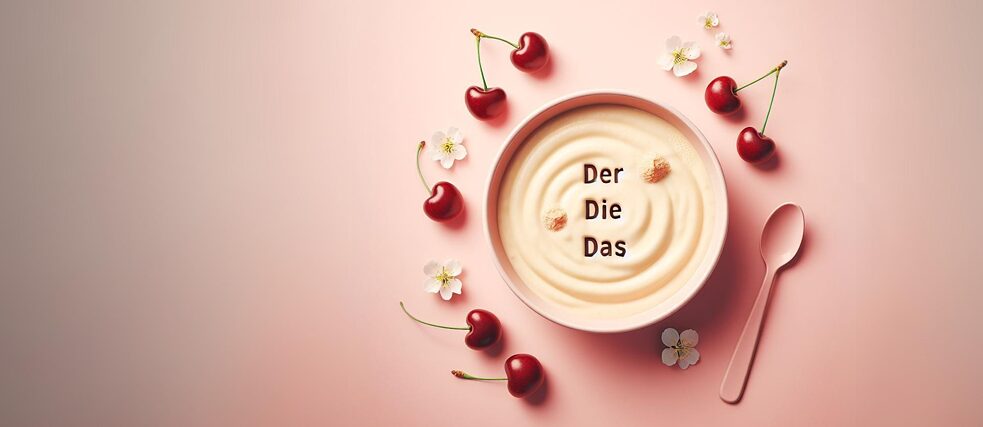 Imagem de um pure de maçã com a escrita de "der, die, das"