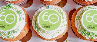 Green and white cupcakes with the Goethe-Institut logo 