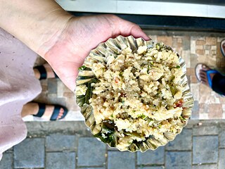 Upma - a savoury semolina porridge with curry leaves and chilli