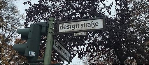 Un panneau de rue indiquant "rue du design"