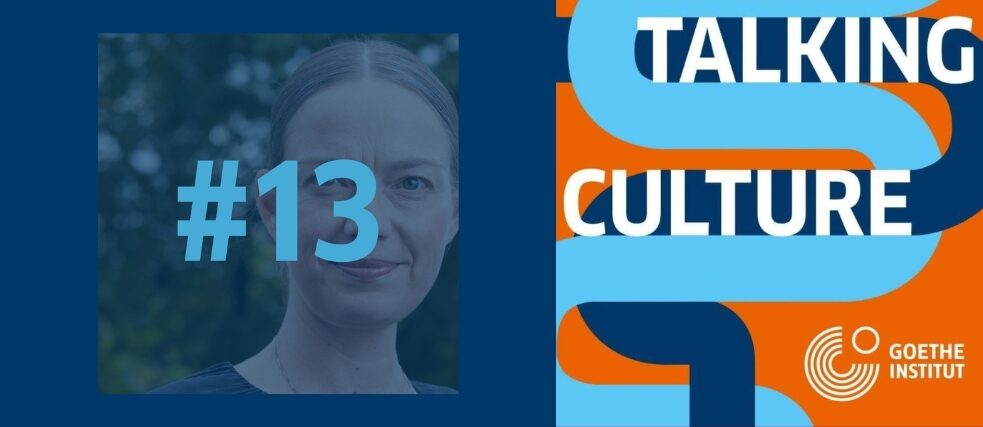 A photo of Mercedes with the number 13 in front of her face and the talking culture logo