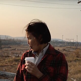 The Right To Be Cold | Still, Svetlana Romanova (Woman sipping drink)