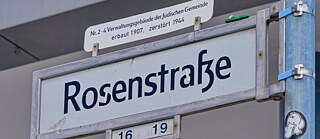 Rosenstrasse street sign in Berlin commemorating the Jewish community center, where the men were imprisoned during the 1943 Rosenstrasse Protest