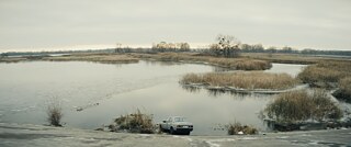 A car drives into a lake