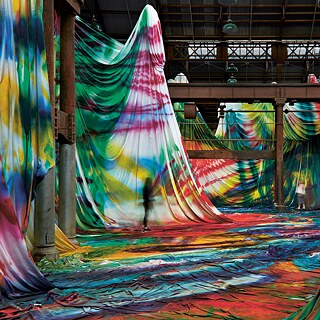 Art installation with a lot of colourful foulards
