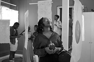 Lady in an art gallery viewing art